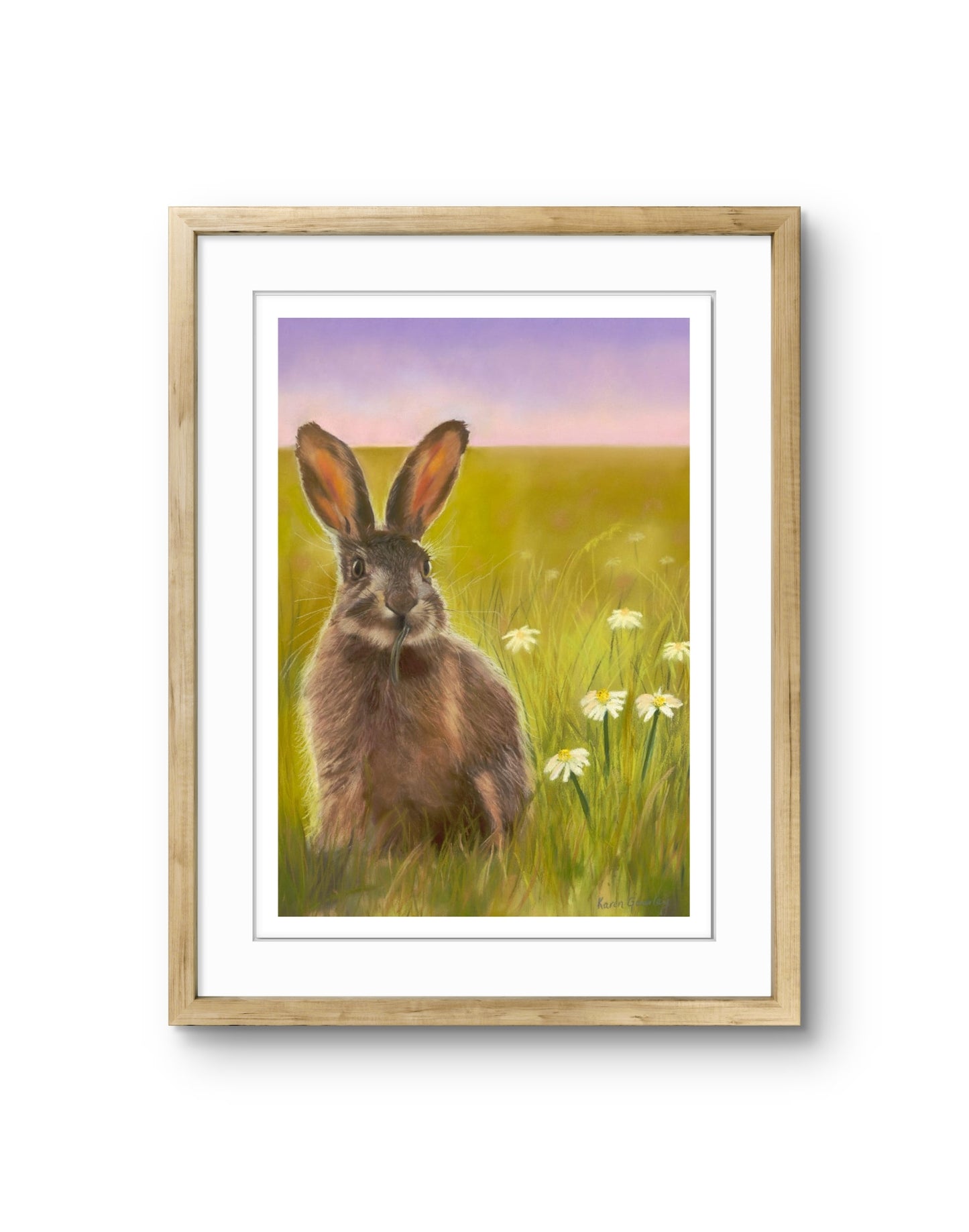Framed artwork of a hare in a field with flowers