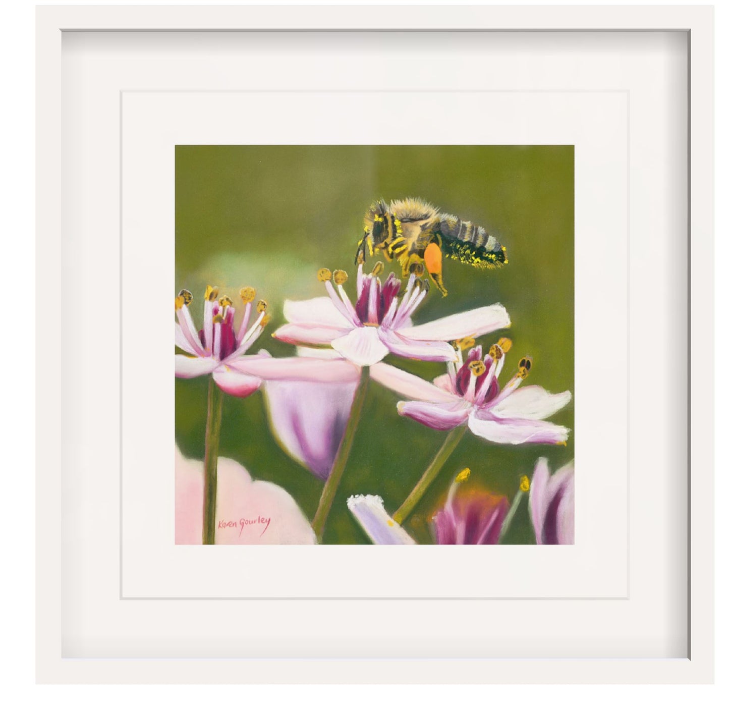 Framed artwork of a bee on flowers with a white frame