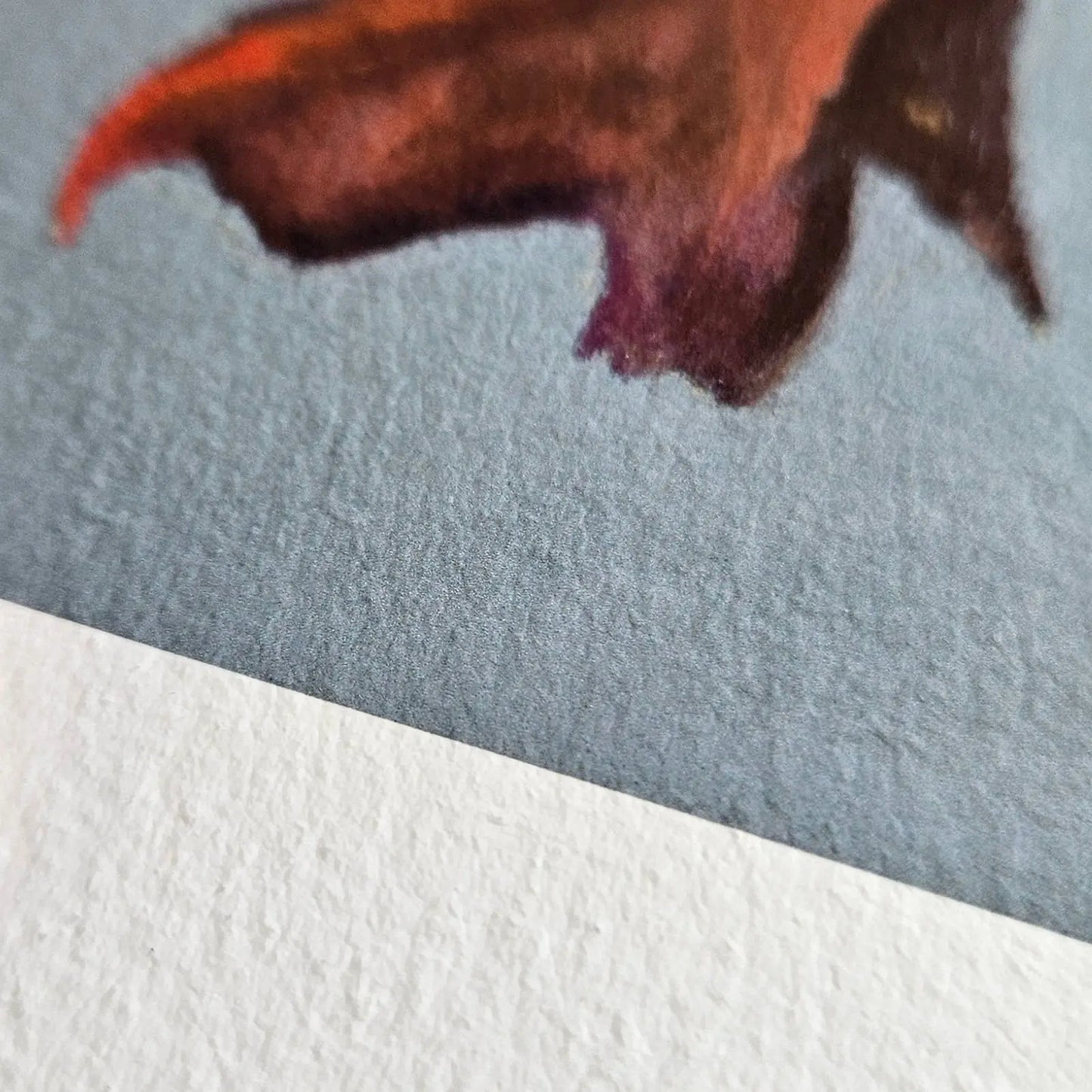 Artistic depiction of a leaf on textured paper
